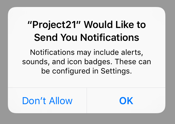 When you request permission to show notifications, iOS shows an alert like this one.