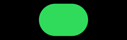 A green capsule or lozenge shape.